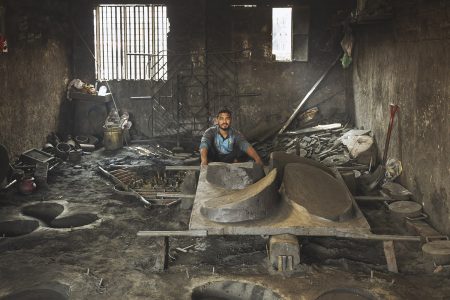 This is a workshop where the propellers for ships are manufactured. Heavy duty metal component repairs and manufacture at Dhaka, Bangladesh Shipyard.