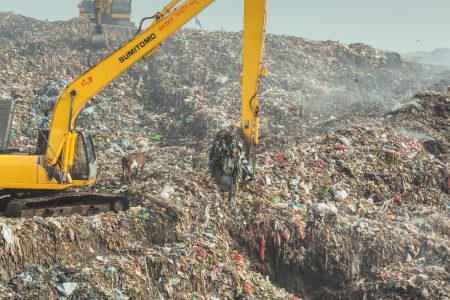 A landscape made of layers of cartons, plastic, etc. Smoky mountain of toxic waste and decaying food at Chittagong, Bangladesh rubbish site.